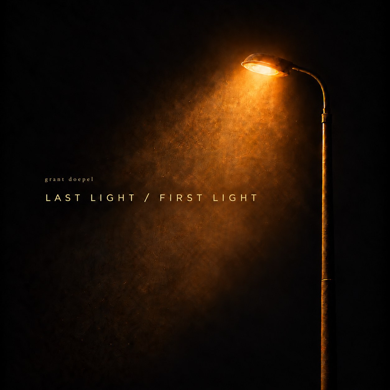 Album cover: a single streetlight glowing amber against a black night sky